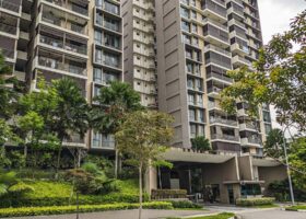 Singapore skyline with modern residential condominiums, illustrating a comparison between executive condominiums and new launch private condos