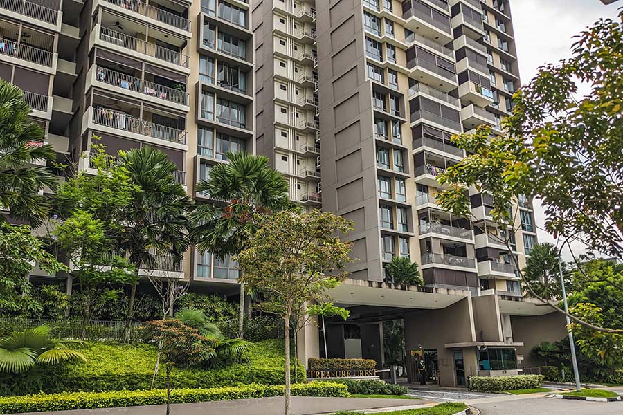 Singapore skyline with modern residential condominiums, illustrating a comparison between executive condominiums and new launch private condos