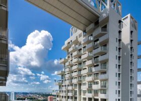 Singapore skyline with modern residential condominiums, illustrating pricing differences between new launch and resale condos